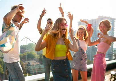 Full shot young people partying outdoors